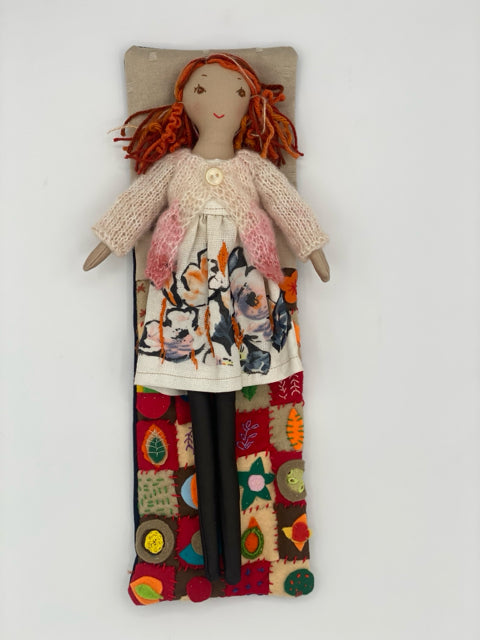 Doll in a Hand-Quilted Sleeping Bag