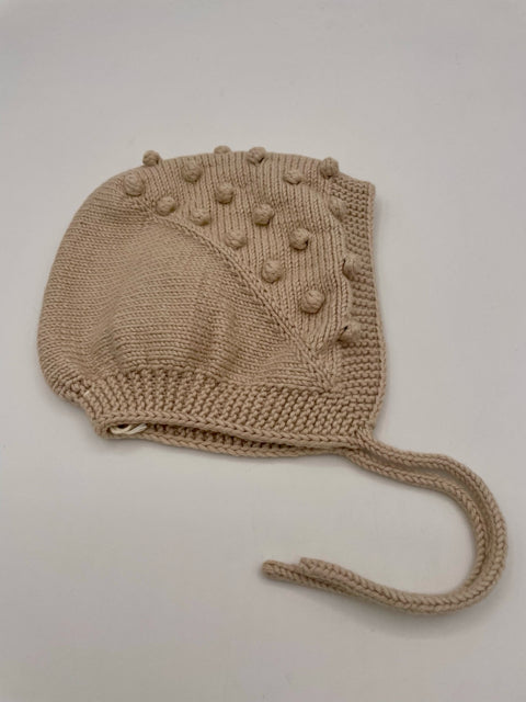 6-9 M Parchment Cotton and Bamboo Knit Baby Bonnet with Bobbles and tie