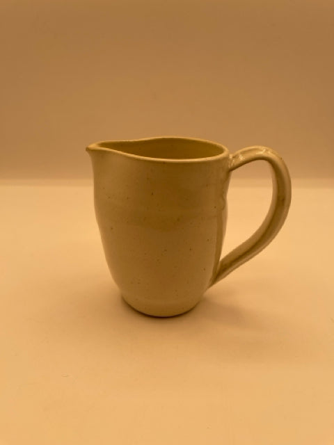 Off-White Stoneware Pitcher