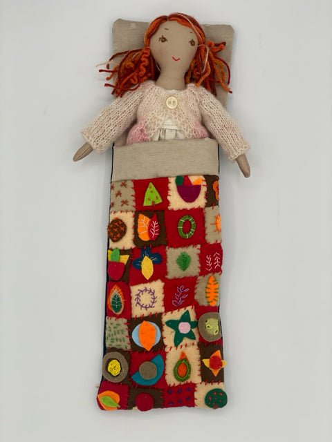 Doll in a Hand-Quilted Sleeping Bag