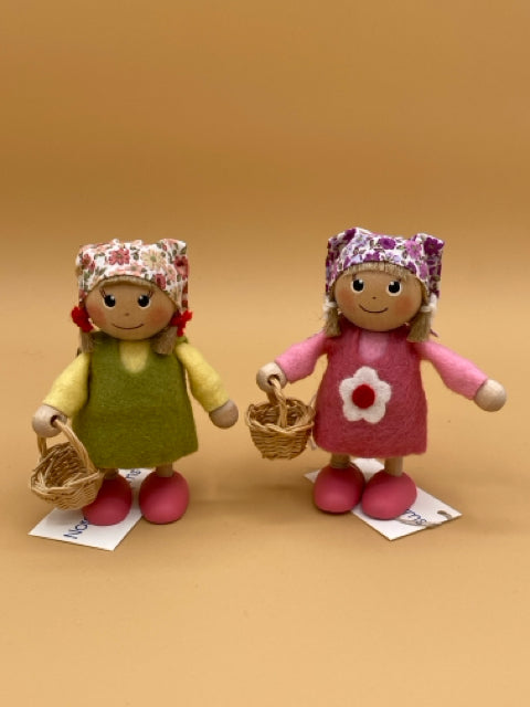 Girl Wearing a Felt Dress Holding a Basket