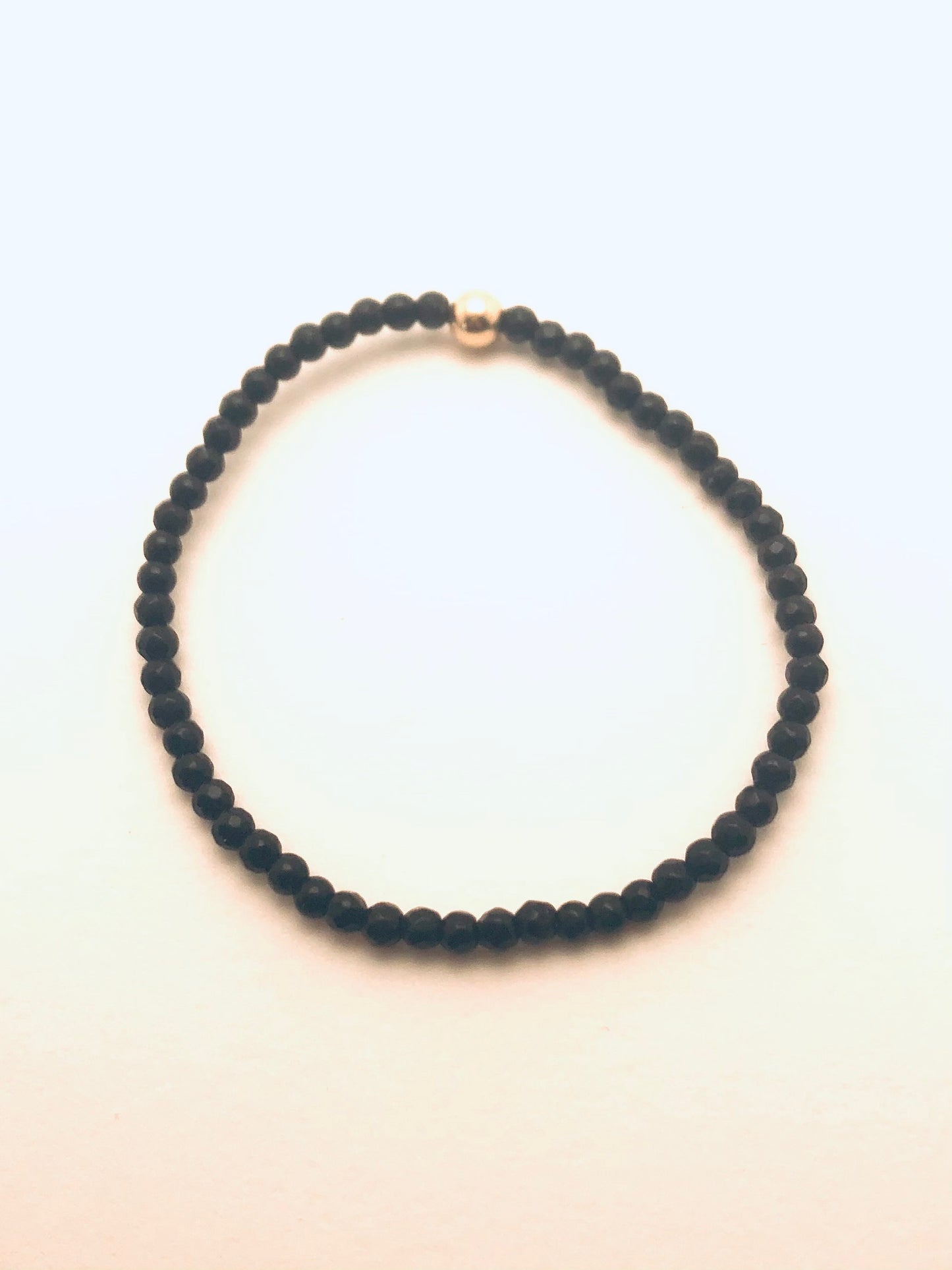 Black Onyx faceted small Gold Bead